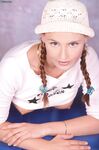 Bestial Vivi-Anne In Hat And Sexy Top Teasing And Showing Her Bald Pussy In Front Of Camera.