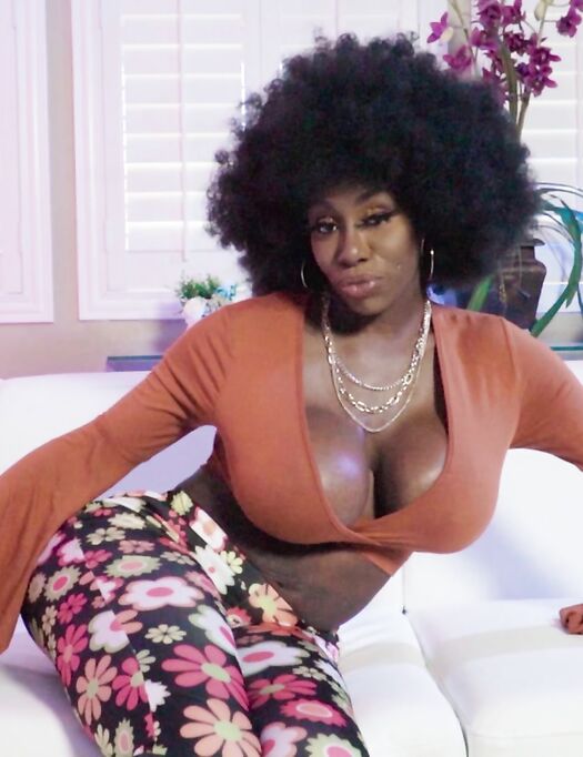Curly-haired Ebony With Big Boobs And Ass Pleasures Her Man On The Sofa photos (Ebony Mystique)